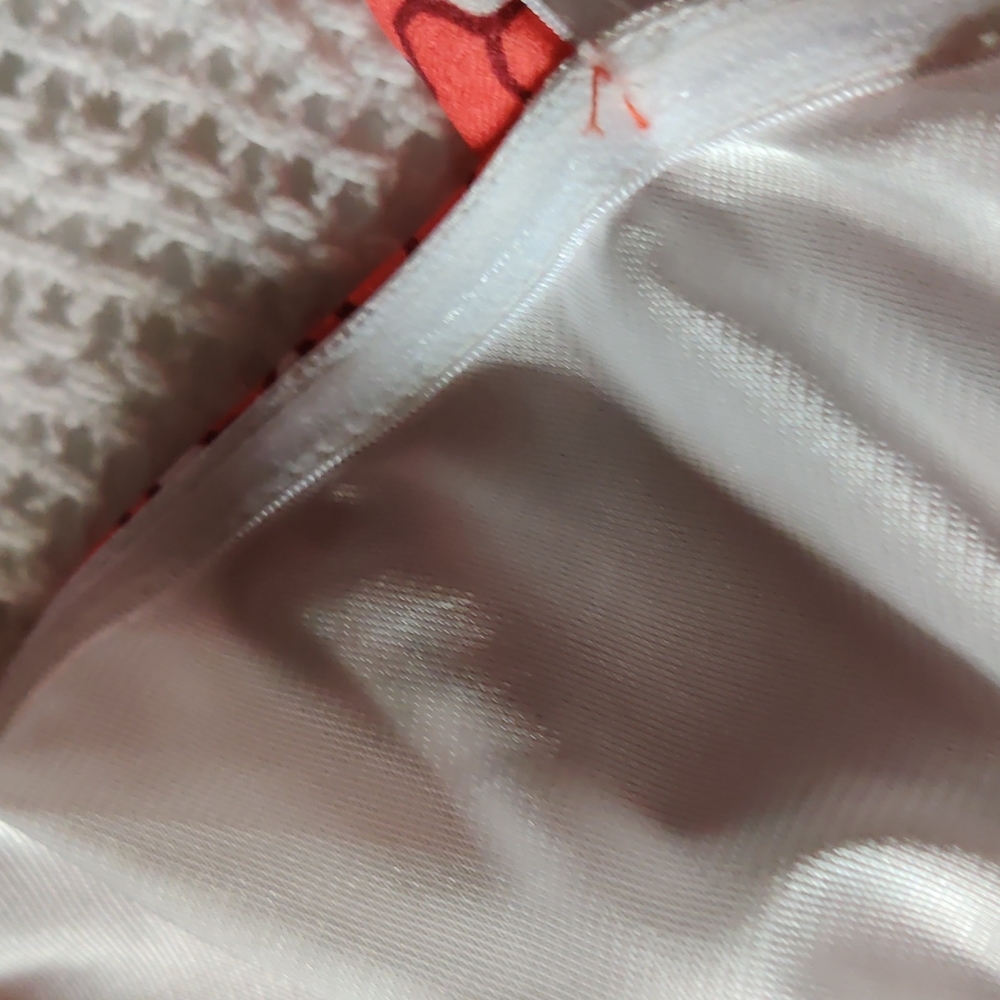 Off the shoulder with attached short sleeves. - Picture 7 of 9